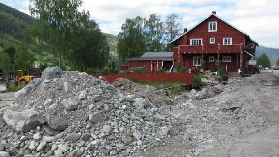 Flommen i mai 2013 gjorde store skader i deler av Gudbrandsdalen. Nord-Fron kommune sitter foreløpig igjen med svarteper etter å ha reddet et boligfelt. (Illustrasjonsfoto fra Kvam sentrum)